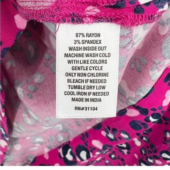 Crown & Ivy Pink & Black Animal Print Ruffle
V Neck Stretch Popover Top - Picture 9 of 9